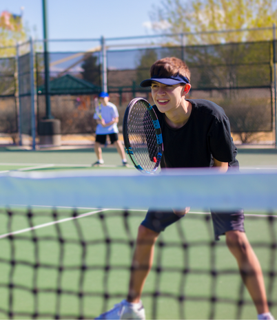 Youth boy playing tennis